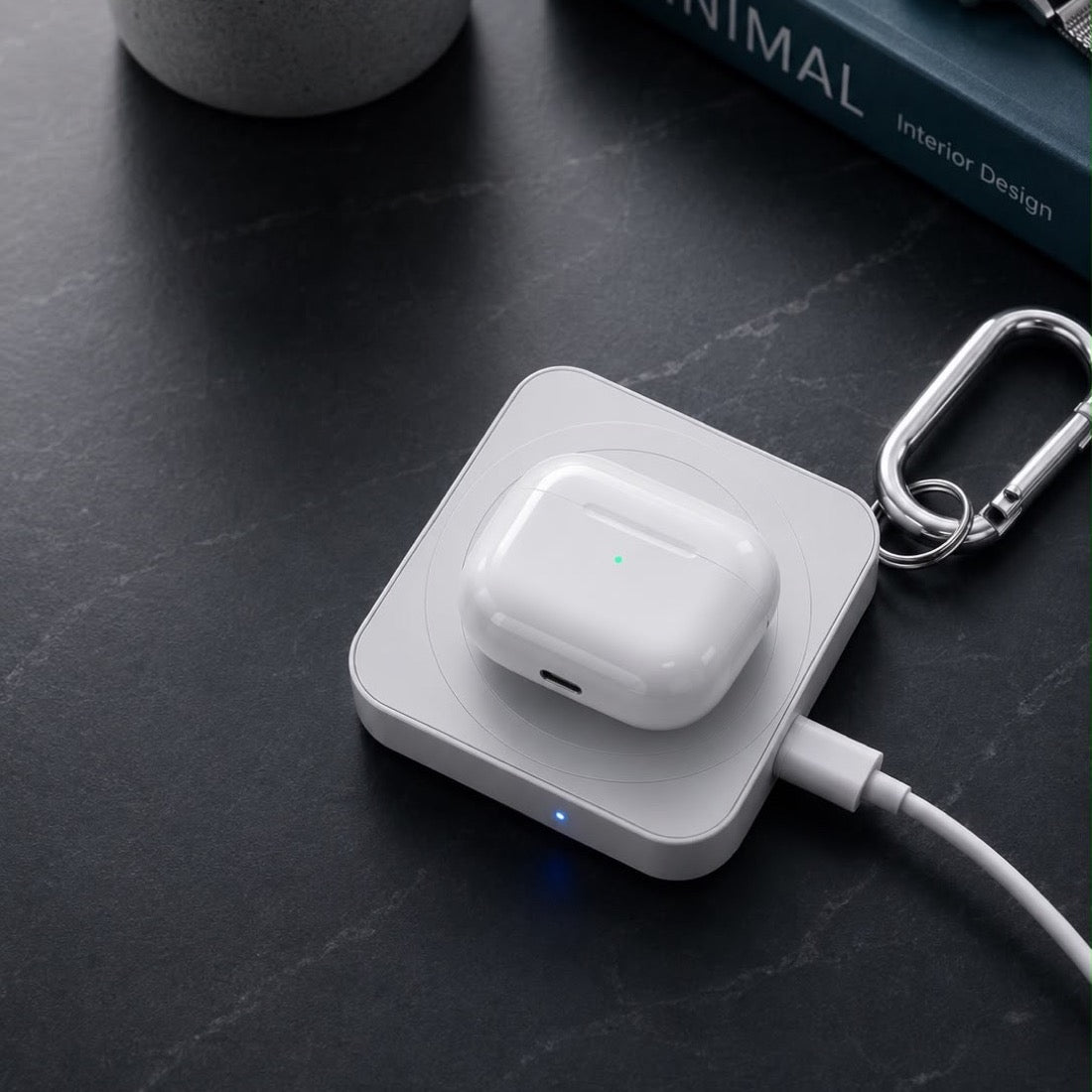 GADLAB wireless charger charging an AirPods case on a dark desk